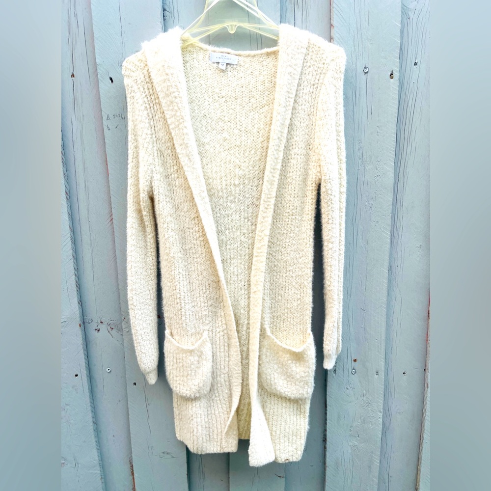 Cardigan sweater, supper soft and comfortable. Great for anytime & w/ anything.
